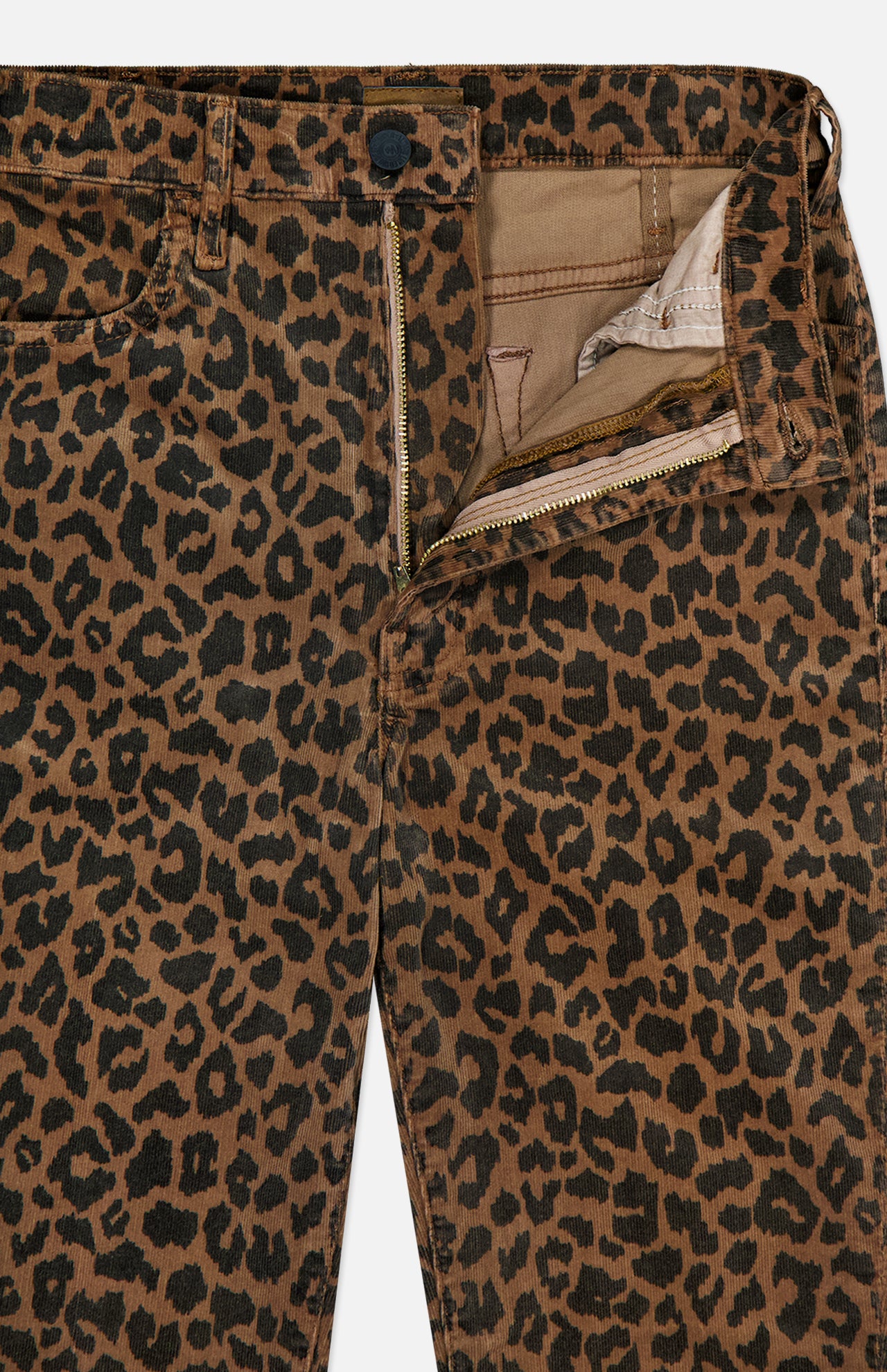 Close-up of The Hustler Flood Pant in Leap Year by MOTHER, a pair of high-rise flare pants in leopard-print stretch corduroy, shown with the zipper and button undone to reveal part of the inside lining and pockets.