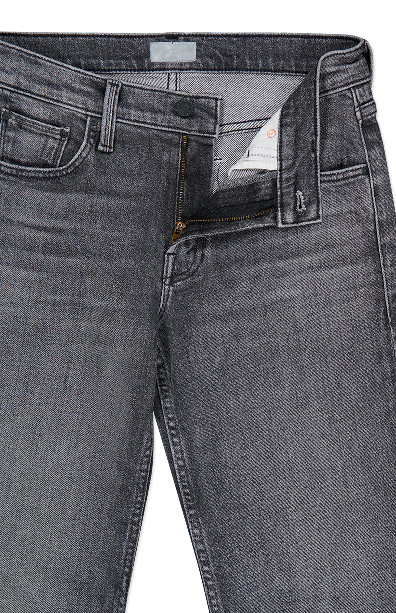 A pair of MOTHER The Jinx Sneak Jeans in Cliffhanger, featuring bootcut gray stretch denim with a partially unzipped front zipper and fastened button. The waistband and pocket details are visible.