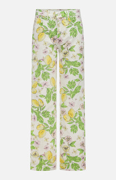 The Kick It Pant in Lemonade Stand by MOTHER features a white high-rise straight leg silhouette with a pastel lemon blossom print, green leaves, and yellow lemons. Crafted from rigid cotton denim with belt loops and pockets.