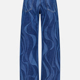 The Lasso Sneak Abstract Print Jean by MOTHER features a high-rise, wide-leg fit, blue-toned abstract stripes, and two back pockets. Shown from the back against a plain white background.