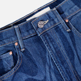 Close-up of the waistband and top front section of The Lasso Sneak Abstract Print Jean by MOTHER, featuring a blue high rise wide leg design with swirling abstract stripes, visible button, belt loops, pocket rivets, and part of a white inner label.