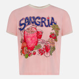 The Lil Goodie Ringer Sangria T-shirt by MOTHER is a light pink, recycled cotton-blend tee featuring a fruity sangria pitcher graphic and bold blue “SANGRIA” lettering on the back.