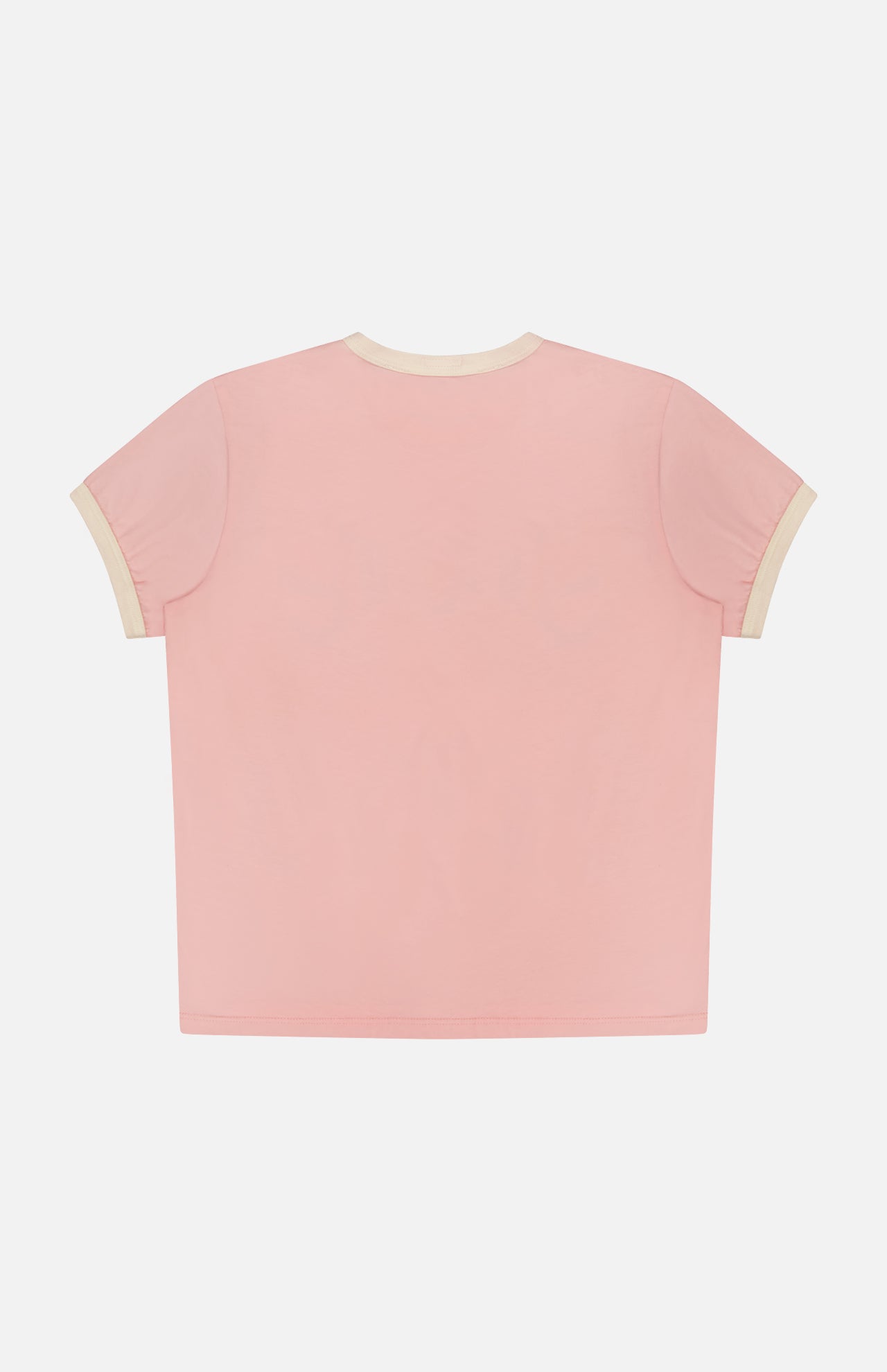 The Lil Goodie Ringer Sangria T-shirt by MOTHER, crafted from a recycled cotton-blend in light pink with cream trim on the collar and cuffs, is shown flat with the back facing up against a white background.