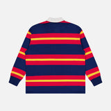 The Long Sleeve Huddle Shirt by MOTHER features thick navy, red, and yellow stripes, a white collar, and is crafted from recycled cotton. Shown from the back against a plain white background.