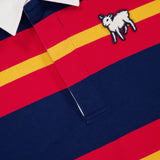 A close-up of MOTHER’s The Long Sleeve Huddle Shirt, featuring red, yellow, and navy blue stripes, a white collar, and an embroidered white lamb patch on the chest. The inside collar label is partially visible.