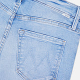Close-up of The Runaway Skinny Jean in Derby Doll by MOTHER, showcasing the back pocket with stitched V-shaped detailing. The visible waistband and belt loops highlight these stylish mid rise jeans.