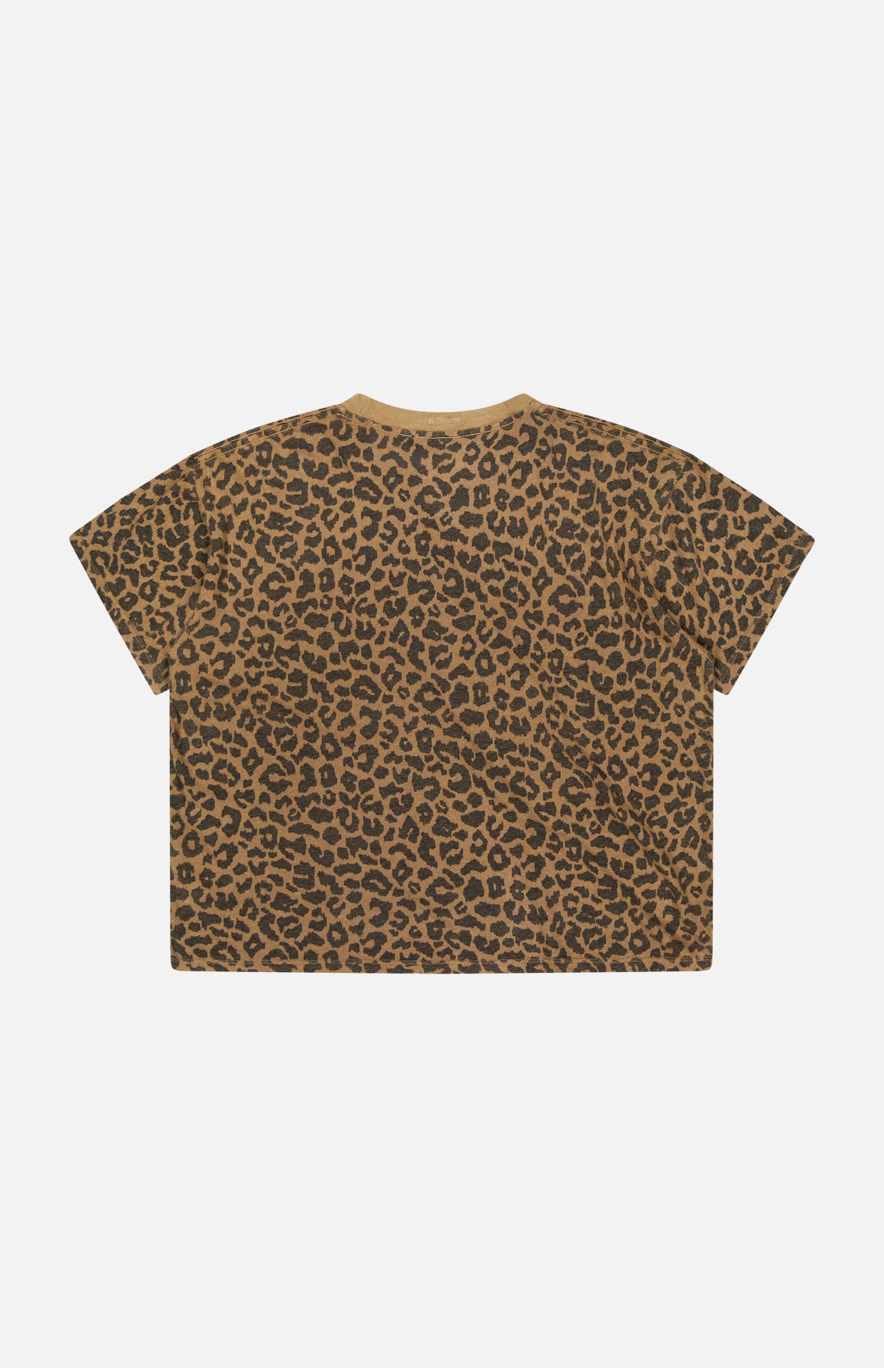The Short Sleeve Boxy Ringer T-shirt by MOTHER features a boxy, cropped silhouette with short sleeves, crafted from a soft cotton-linen blend and adorned with an allover brown and black cheetah print. The crew neck top is displayed flat against a white background.