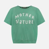 The Short Sleeve Concert Shirt by MOTHER is a green 100% cotton crew neck tee with bold, white "MOTHER NATURE" lettering across the chest.