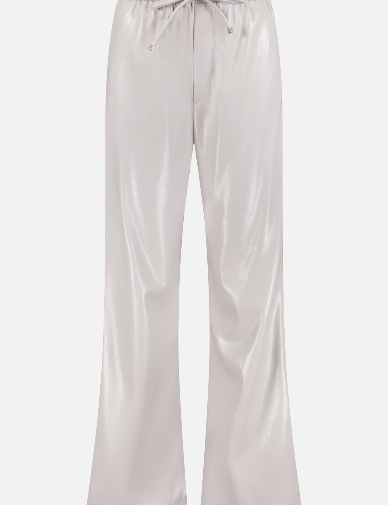 The Calie Faux Leather Trouser by NANUSHKA features light gray, shiny Okobor fabric, a wide-leg cut, and an elastic drawstring waist, shown against a white background.