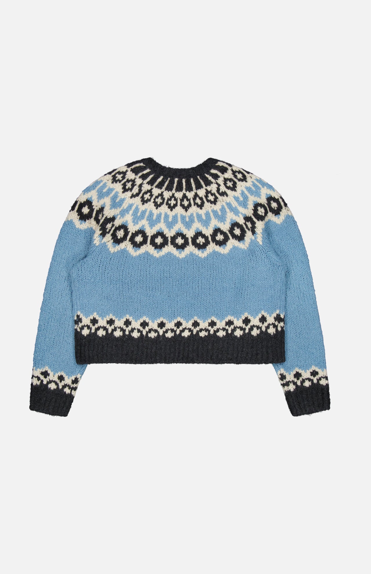 Nili Lotan Isaline Fair Isle sweater in light blue, featuring a black and cream patterned yoke and hem.