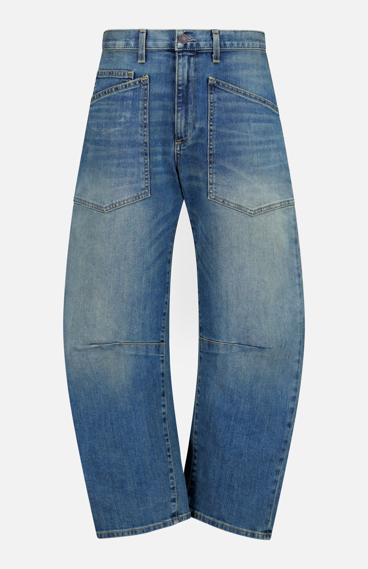 Nili Lotan Shon Jean in Classic Wash: mid-rise blue jeans with a curved, wide-leg bow leg silhouette and two large patch pockets on the front.