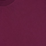 Close-up of the Adam Crewneck T-Shirt by NN07 in dark red, perfect for a modern-casual wardrobe, featuring a classic crew neck and a small white NN07 label partially visible near the collar.
