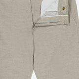 Beige Aden Office Stretch Pant by NN07 with a partially opened zipper and button fly, showing the white lining and an NN07 waistband label—ideal for a modern-casual wardrobe.