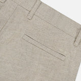 Close-up of the NN07 Aden Office Stretch Pant in light grey, made from an organic cotton-blend with belt loops, a welt back pocket, and subtle stitching details.