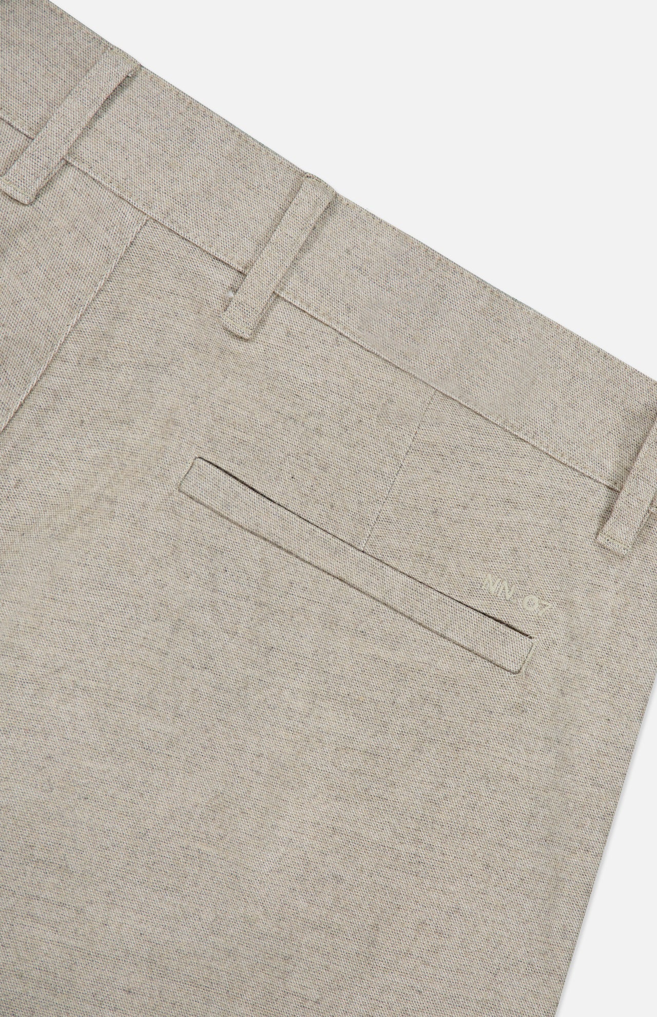 Close-up of the NN07 Aden Office Stretch Pant in light grey, made from an organic cotton-blend with belt loops, a welt back pocket, and subtle stitching details.
