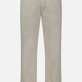 The Aden Office Stretch Pant by NN07: beige straight-leg trousers in an organic cotton blend with belt loops, front button closure, and side pockets—an essential modern-casual piece shown on a white background.
