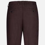 Back view of NN07 Billie Drawstring Shorts in dark brown linen-viscose, shown against a white background. Features include an elastic waistband with drawstring, belt loops, and two buttoned back welt pockets.