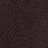 Here’s a revised version using the provided product data: Close-up of the NN07 Danny Crewneck Sweater in chocolate brown, featuring a ribbed crew neck and a white neckline tag with the brand name. Crafted from a lightweight polyester blend, this sweater offers both comfort and contemporary style in a modern silhouette.