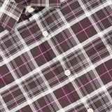 Close-up of the Deon Checkered Long Sleeve Shirt by NN07, featuring a relaxed fit and a brown, white, and purple checked pattern. The shirt collar and a white NN07 label are visible.