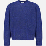 The NN07 Jim Crew Neck Knitted Sweater is crafted from a soft wool-blend jersey knit in a bright blue shade, featuring a relaxed fit with long sleeves and ribbed cuffs, hem, and crew neckline, and is displayed on a white background.