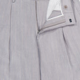 The Kay Striped Linen Trouser Pant by NN07 features light grey pinstripes, a straight leg, relaxed fit, open zipper fly, visible waistband with button closure, white lining detail, belt loops, and a partially elastic waist.