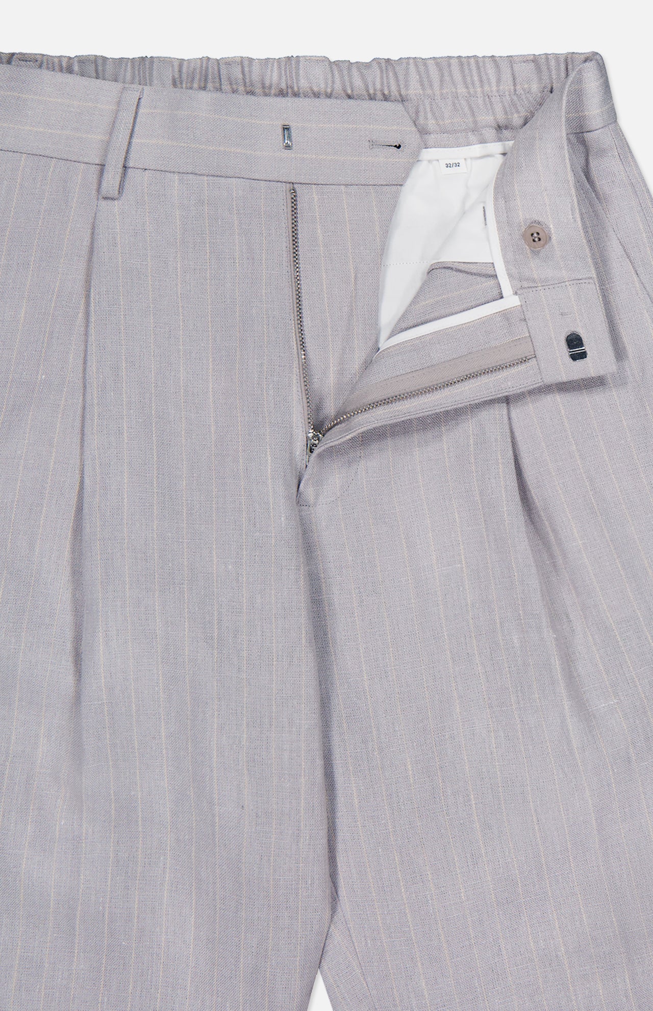 The Kay Striped Linen Trouser Pant by NN07 features light grey pinstripes, a straight leg, relaxed fit, open zipper fly, visible waistband with button closure, white lining detail, belt loops, and a partially elastic waist.