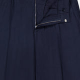The Kay Relaxed-fit Trouser Pant by NN07 in navy blue features a relaxed fit with a partially open zipper and clasp waistband, showcasing the top front and waistband details against a white background.