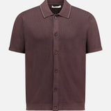 The NN07 Nalo Full-button Polo Shirt is a dark brown, short-sleeve, textured polo with a collar and straight hem, shown on a plain white background—ideal for a modern-casual look.
