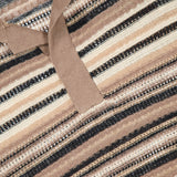 Close-up of the Noam Linen Knit Polo Shirt by NN07, featuring brown, beige, black, and white stripes with a casual Jonny collar. The NN07 tag near the collar emphasizes the shirt's varied textures and knit's thickness.