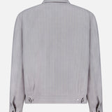 Back view of the NN07 Petrus Striped Linen Jacket in light gray, featuring subtle vertical pinstripes, a classic collar, buttoned cuffs, and adjustable button tabs at the waistband.