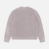 The NN07 Russell Crewneck Sweater is shown from the back in light grey, featuring long sleeves and a classic crew neck—an essential for the modern-casual wardrobe, set against a plain white background.