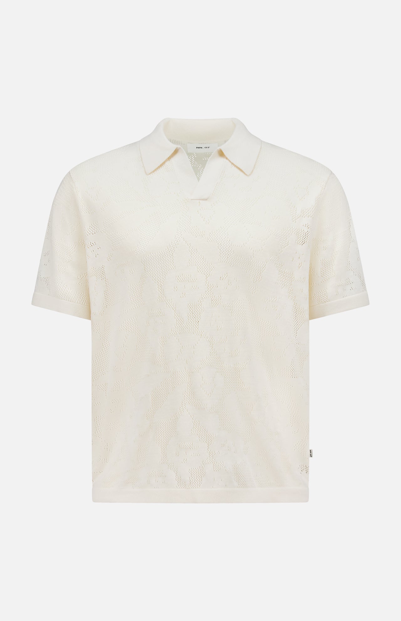 The NN07 Ryan Flower Design Short Sleeve Shirt is an ivory organic cotton polo with a subtle flower jacquard pattern, classic collar, and relaxed fit, shown against a plain white background.