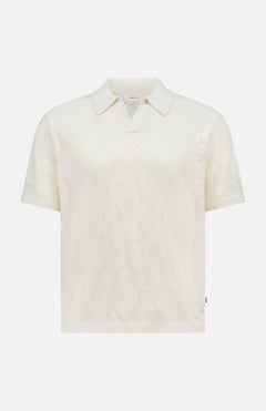 The NN07 Ryan Flower Design Short Sleeve Shirt is an ivory organic cotton polo with a subtle flower jacquard pattern, classic collar, and relaxed fit, shown against a plain white background.