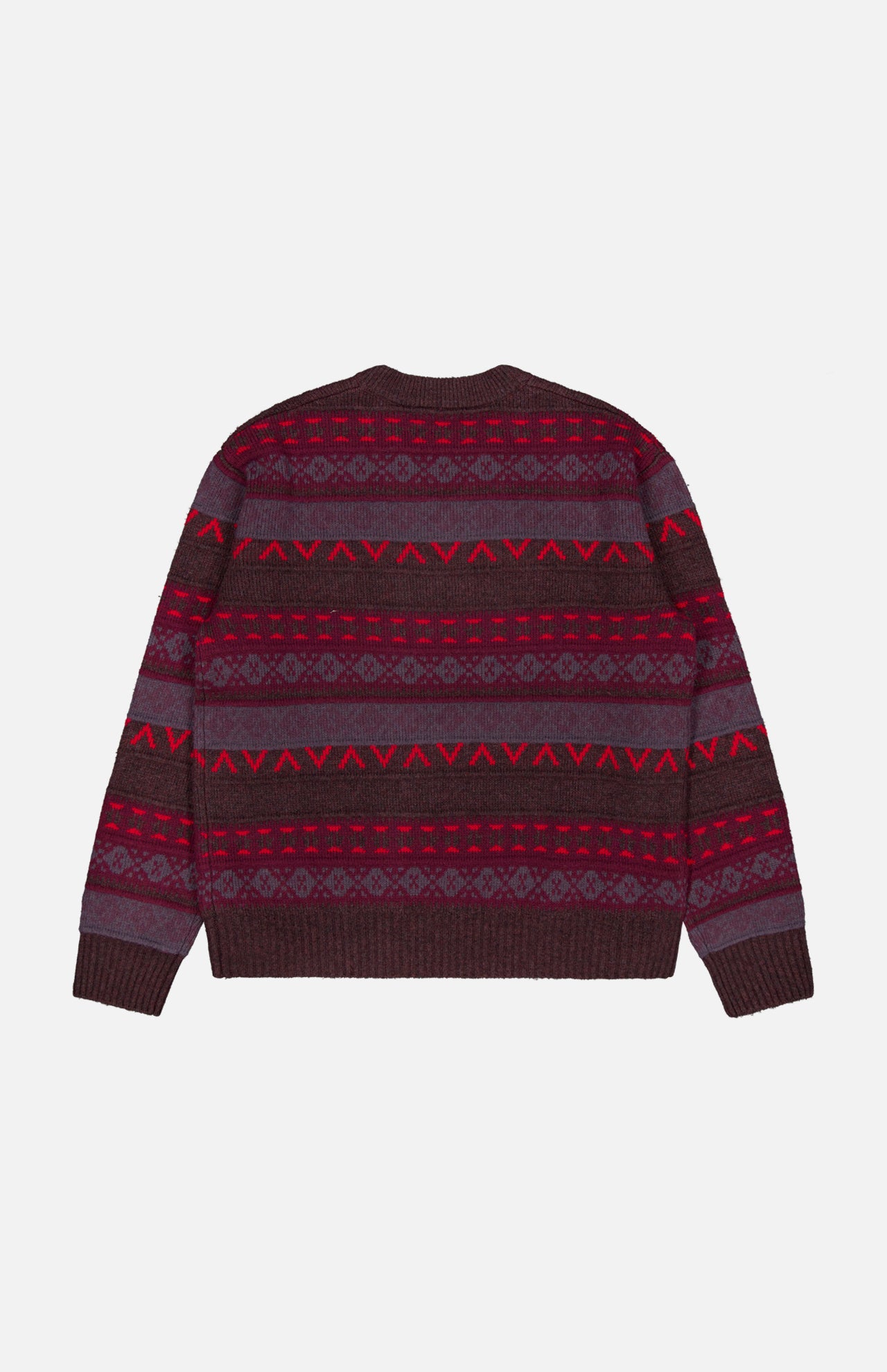 The Tobias V-Neck Sweater by NN07 showcases a bold berry palette with maroon, dark purple, and red geometric patterns in classic Fair Isle style. Featuring a flattering v-neckline and long sleeves, this knitted piece brings modern versatility to any casual wardrobe.