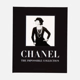 The cover of Chanel: The Impossible Collection by ASSOULINE showcases a black-and-white photo of a woman in classic Chanel style on a black background, perfectly reflecting the brand’s timeless elegance and modern luxury.