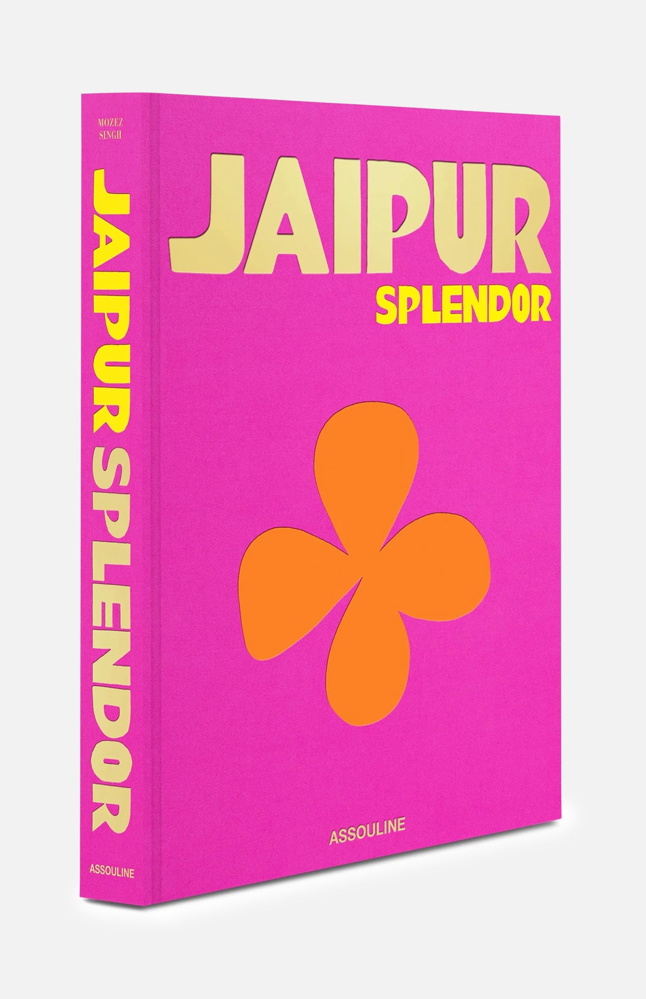 ASSOULINE’s Jaipur Splendor is a beautifully designed book with bold yellow and beige text on a vibrant pink cover, highlighted by a striking orange four-petal flower—an ideal inspiration for your next Jaipur adventure or to immerse yourself in the rich world of Jaipur travel.