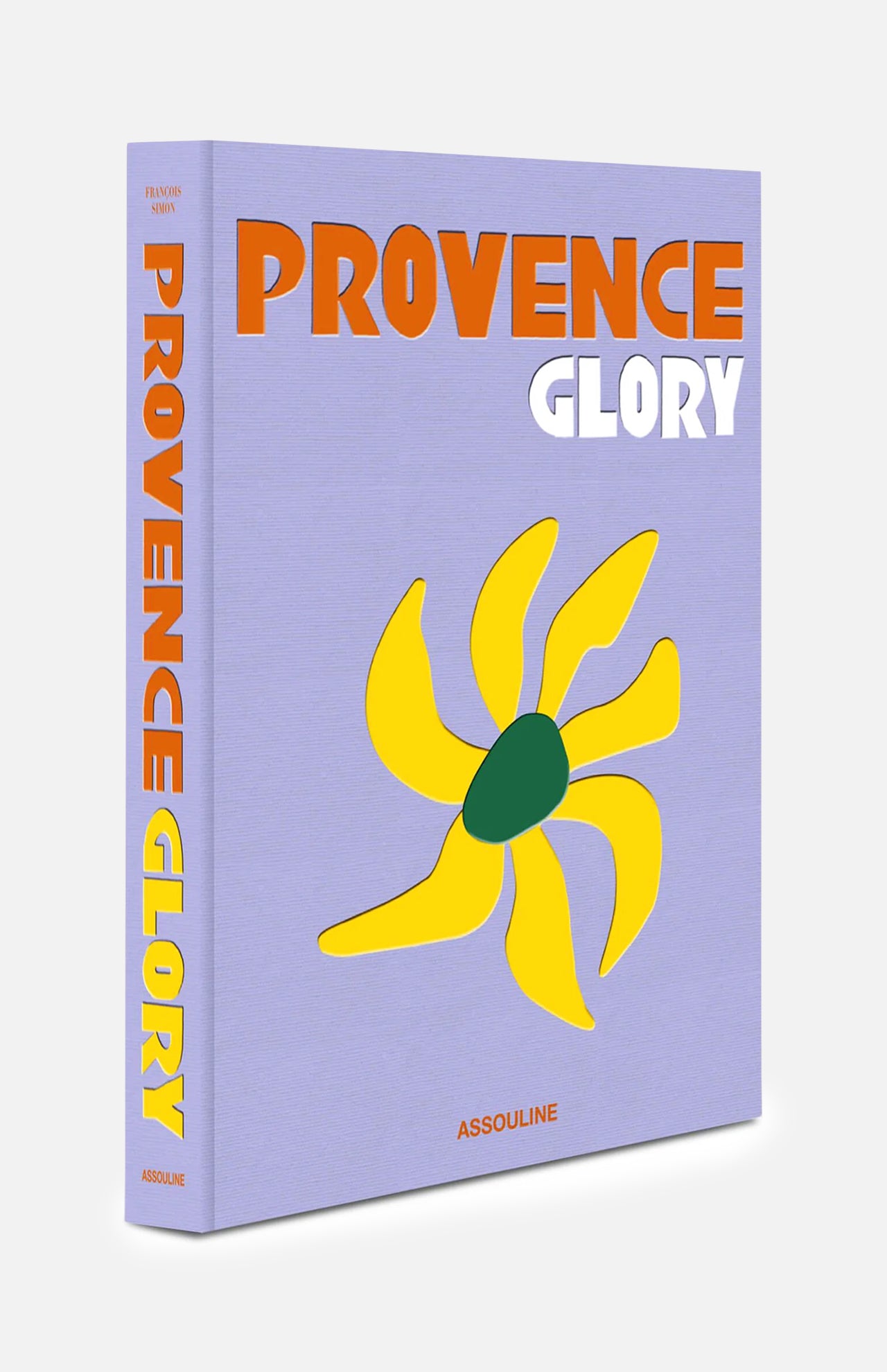 ASSOULINE’s Provence Glory features a lavender cover with bold orange and white lettering, adorned with a yellow abstract sun design with a green center—capturing the vibrant spirit and timeless charm of the South of France.