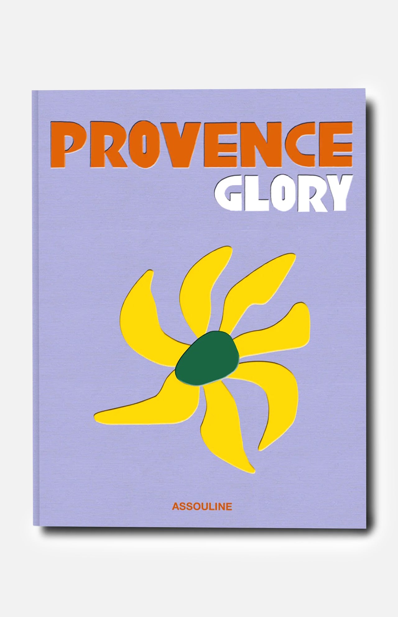 The book cover for *Provence Glory* by ASSOULINE features a lavender background, bold orange and white lettering displaying the title, a stylized yellow flower with a green center inspired by the South of France, and the brand name ASSOULINE in red at the bottom.
