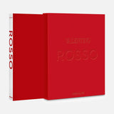 Valentino Rosso by ASSOULINE is a vibrant red book presented in a matching slipcase. Inspired by haute couture, its cover and spine display minimal embossed text, with the ASSOULINE brand elegantly placed at the bottom—a sophisticated homage to iconic Valentino dresses in the signature Rosso Valentino shade.