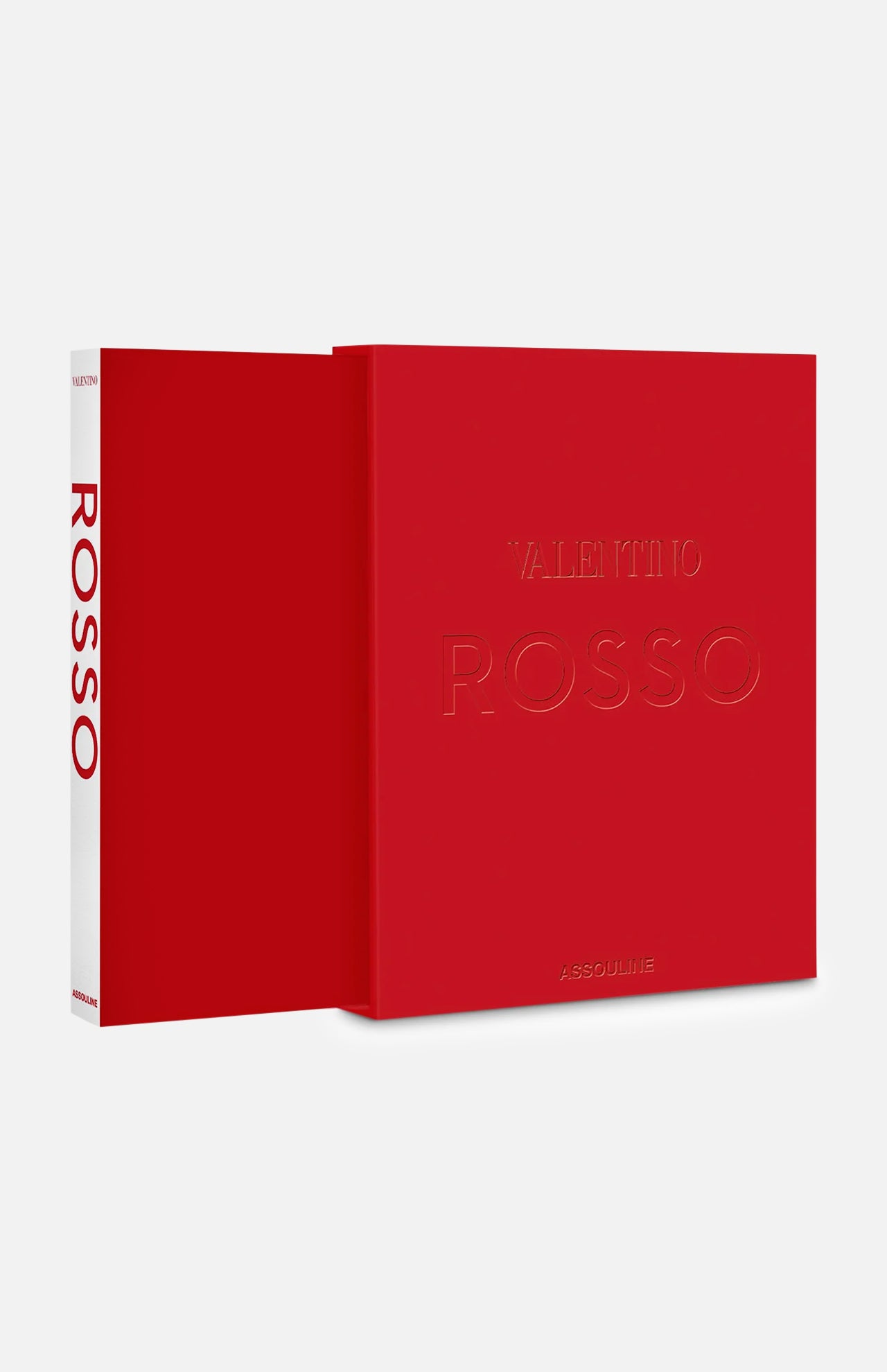 Valentino Rosso by ASSOULINE is a vibrant red book presented in a matching slipcase. Inspired by haute couture, its cover and spine display minimal embossed text, with the ASSOULINE brand elegantly placed at the bottom—a sophisticated homage to iconic Valentino dresses in the signature Rosso Valentino shade.
