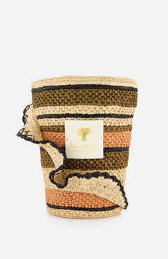 The Fetty Max 24 Candle by BAOBAB COLLECTION features a woven basket-style holder with horizontal beige, olive green, and peach stripes, ruffled detail, Baobab label, and an orchid ylang-ylang summer fragrance.