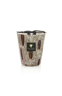 The BAOBAB COLLECTION Maxi Wax Panya Max 16 candle features African-inspired brown, white, and black ovals on hand-blown glass, finished with a black ribbon tied at the top.