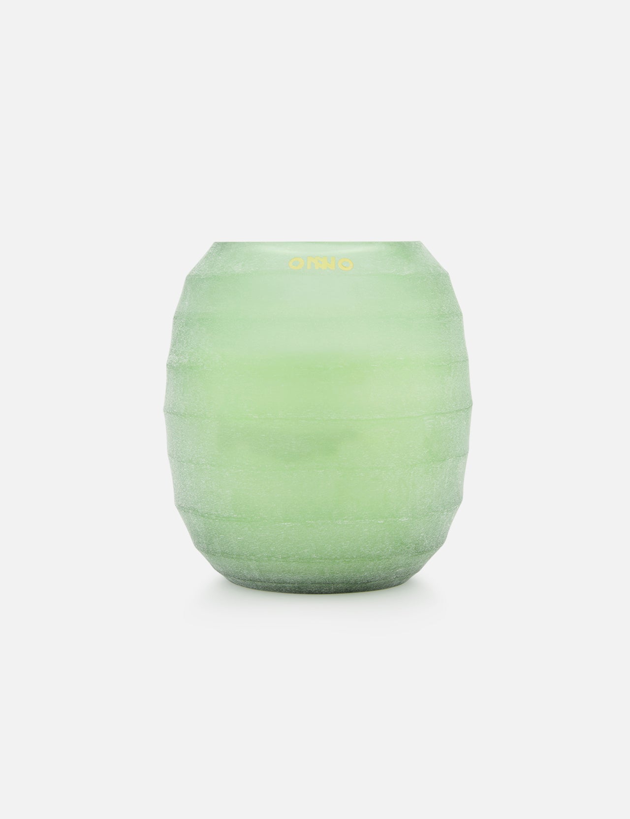 The ONNO Waves Green S is a frosted light green, round glass vase with horizontal ridges, reminiscent of luxury candles, showcased against a plain white background.