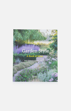 The RIZZOLI book "Garden Style" features a lush garden scene on its cover, with pathways, lavender, and greenery—offering planting inspiration and fresh garden design ideas.