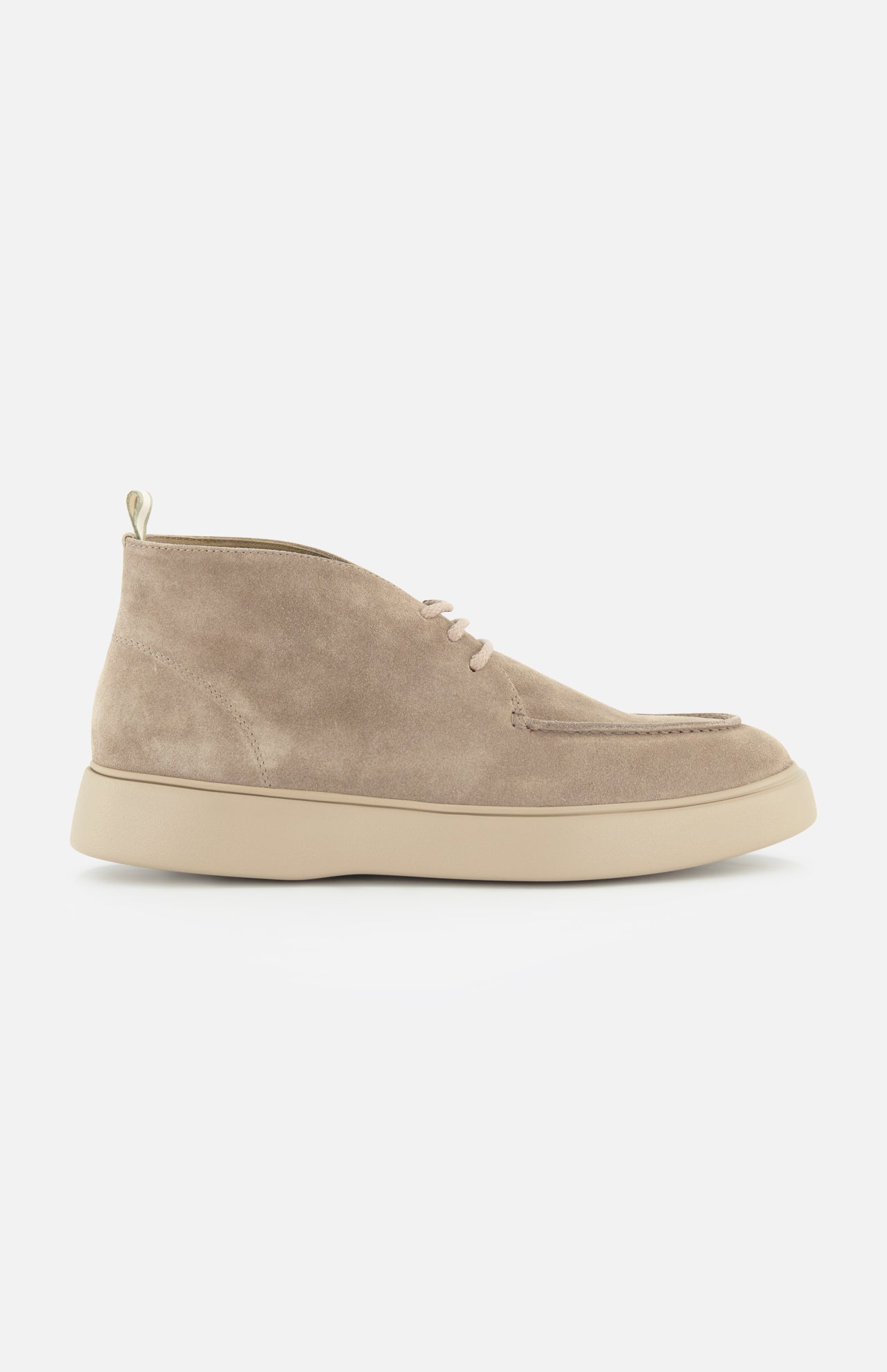 The Frame Suede Lace Chukka Boot by OFFICINE CREATIVE is a beige suede chukka boot, handmade in Italy, featuring a rounded toe, lace-up front, and a light-colored thick rubber sole, displayed in a side view on a plain white background.