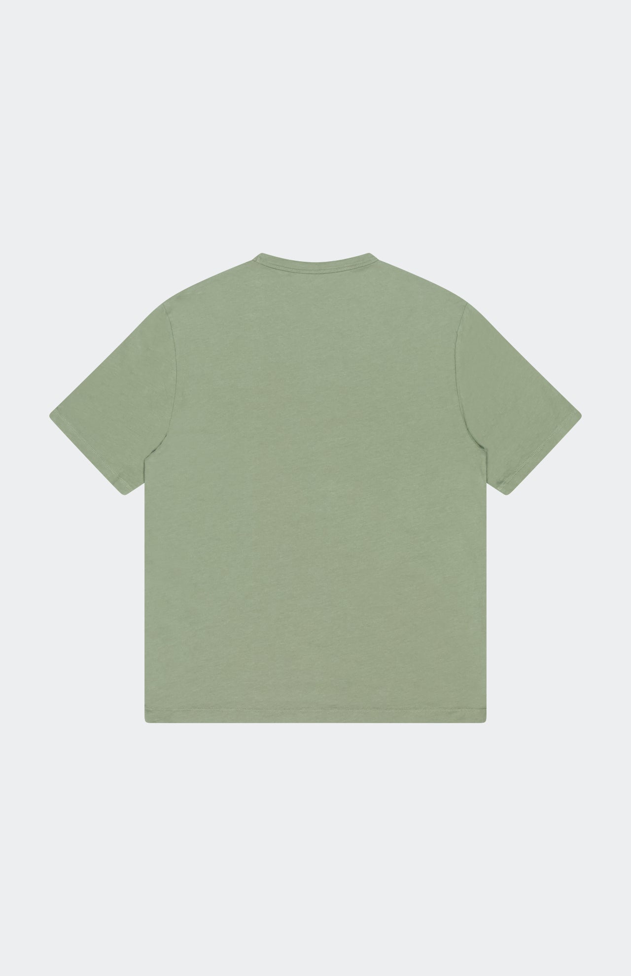 The OFFICINE GÉNÉRALE Cotton Crewneck T-shirt in sage green, featuring short sleeves and a classic crew neck, is displayed laid flat with the back side facing up on a light gray background.