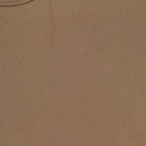 A close-up of the Darius Suprpo Stripe Shirt by OFFICINE GÉNÉRALE highlights its striped pattern and refined details, with a white label displaying the brand name—ideal for elevating any layered look.