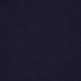 A close-up of the OFFICINE CREATIVE Cotton Crewneck T-shirt in dark navy blue showcases its smooth fabric texture and part of the neckline, highlighting this classic men's casual tee.