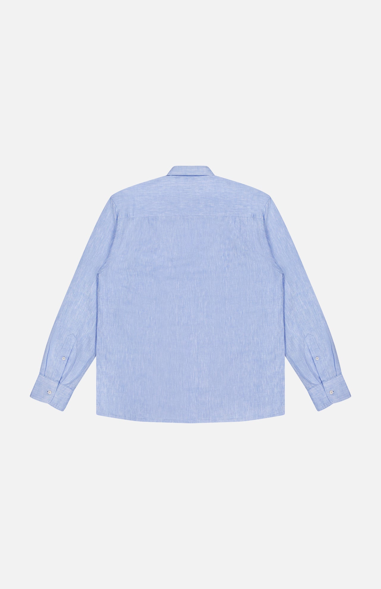 The OFFICINE GÉNÉRALE Guido Slub Cotton Shirt is a light blue, long-sleeve button-up with a classic collar, made from 100% cotton and shown from the back against a white background.