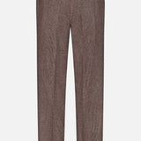 The Hoche Wool Trouser Pants by OFFICINE GÉNÉRALE feature a classic brown herringbone pattern, tailored fit with belt loops, front crease, and two buttoned back pockets. These light brown trousers offer a refined appearance and are shown against a plain white background.